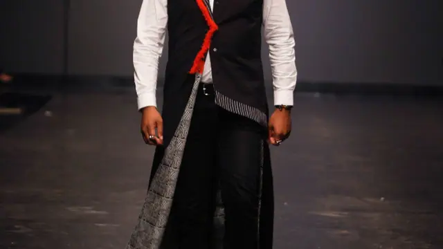 Olufeko on the runway of Lagos Fashion Week 2018 for Kiki Kamanu